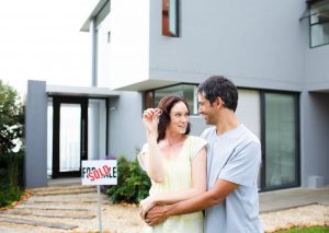 happy-couple-after-buying-house